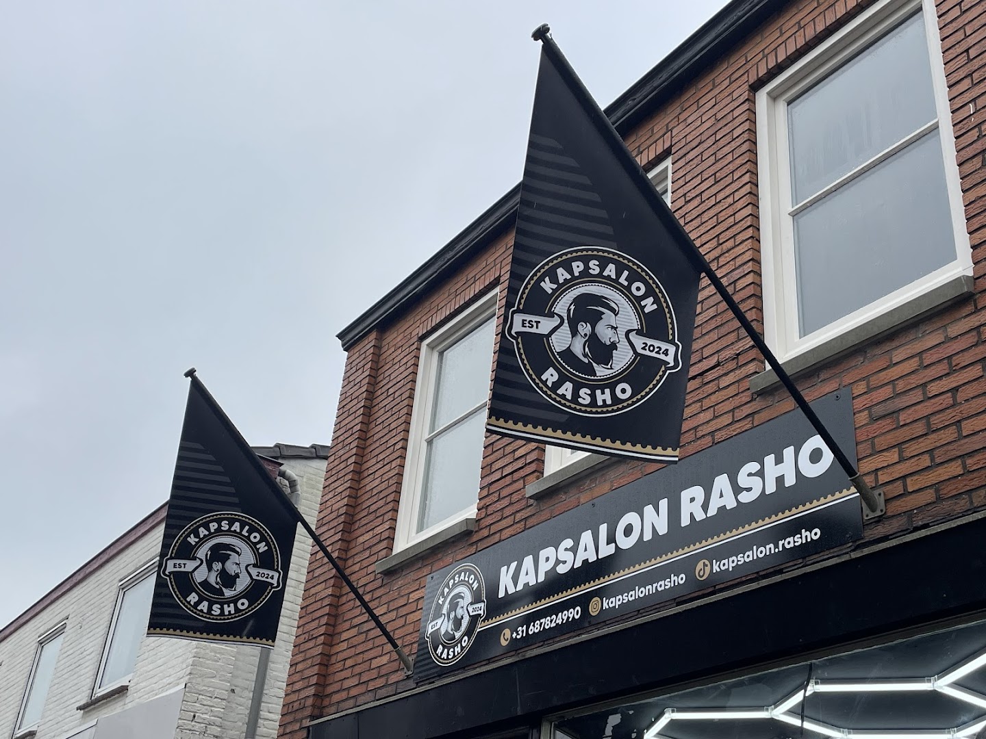 Gevel van Kapsalon Rasho aan de Marktstraat in Made
